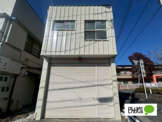 ��{���ݓX��